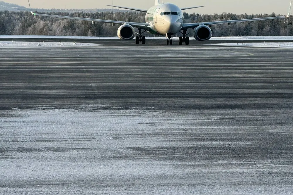 An aircraft on the snow-covered apron