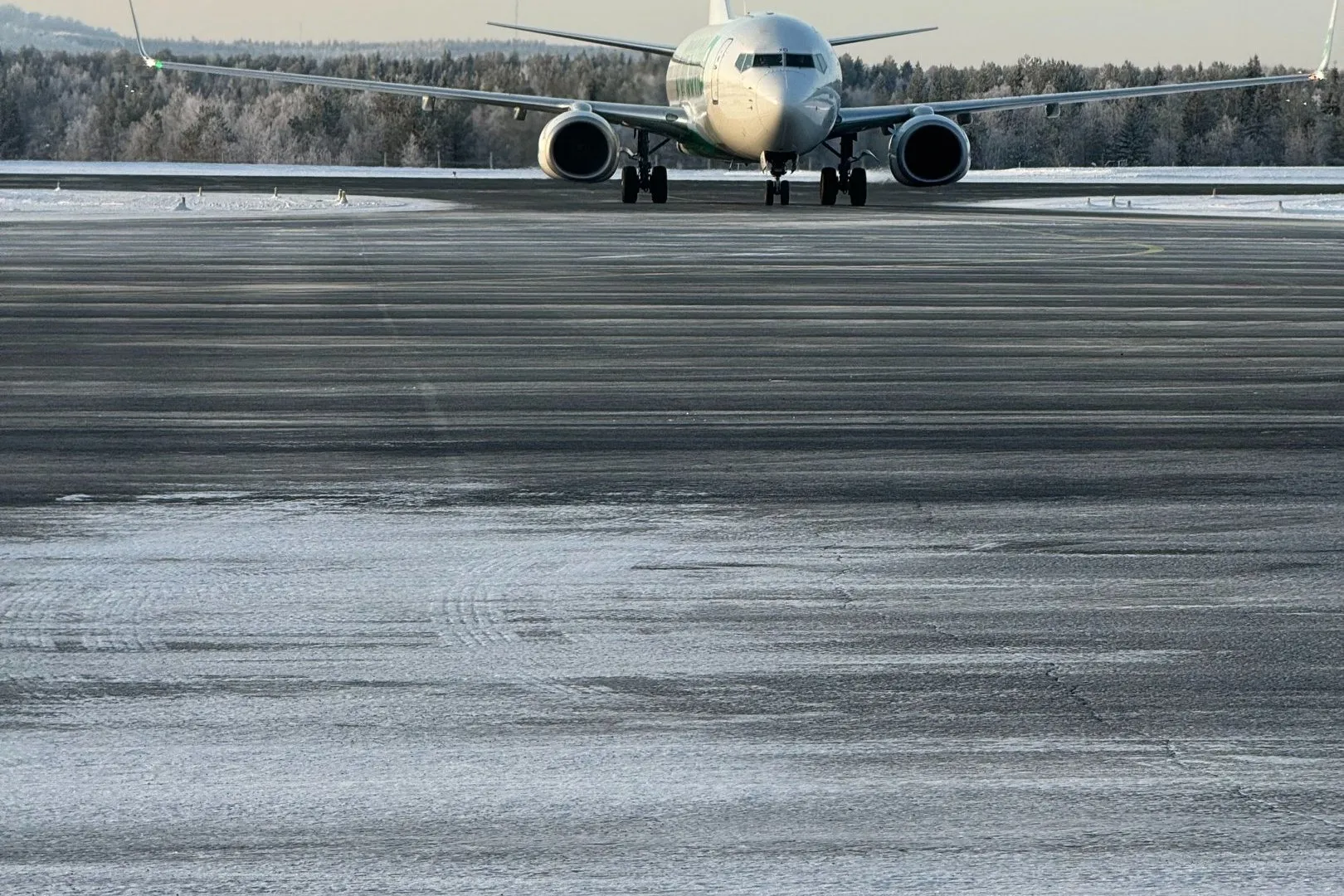 An aircraft on the snow-covered apron