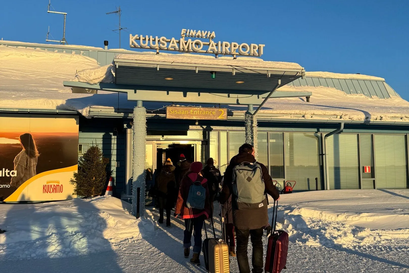 Arriving at Kuusamo airport, pulling our cases across the snow